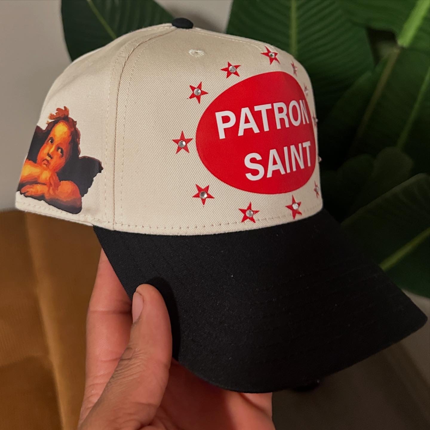 Patron Saint baby angelic snap back